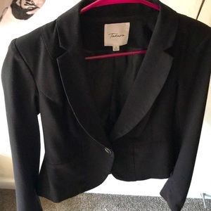 A black Takara small business jacket
